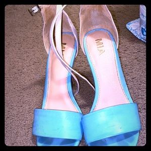 Light blue and tan colored heels